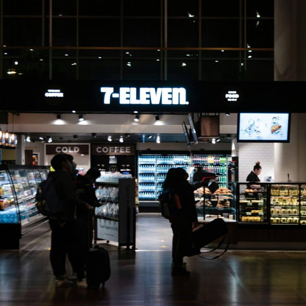 people at airport convenience store looking for healthy foods for traveling